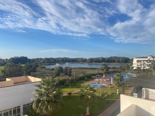 a view of a lake from a building at Ap13 marina golf course in Saïdia