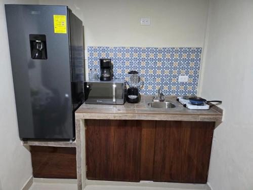 Η κουζίνα ή μικρή κουζίνα στο Hanna Suite