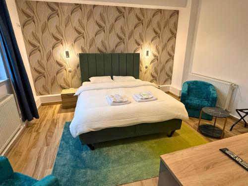 Ένα ή περισσότερα κρεβάτια σε δωμάτιο στο Byzanthin rooms