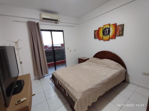 Ένα ή περισσότερα κρεβάτια σε δωμάτιο στο Acogedor departamento en excelente ubicación ENCAR