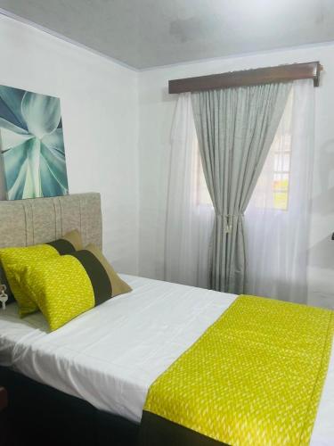 Ένα ή περισσότερα κρεβάτια σε δωμάτιο στο Hospedaje Finca Talulos