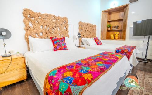 Llit o llits en una habitació de Nido Colonial