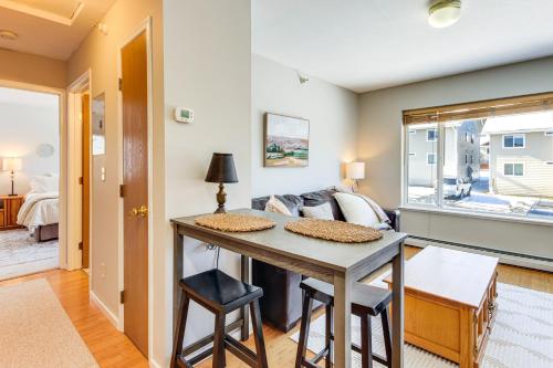 a living room with a table and a couch at Less Than 1 Mi to Big Sky Resort Quiet Mtn-View Retreat in Big Sky Mountain Village