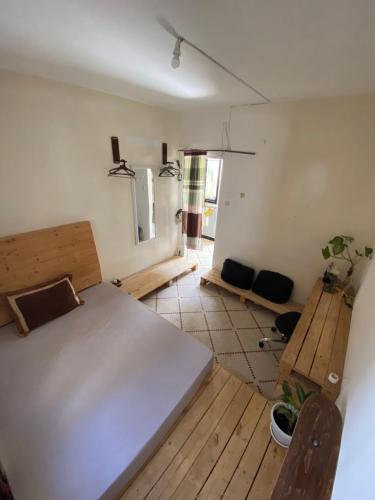 Ένα ή περισσότερα κρεβάτια σε δωμάτιο στο Villa Éden