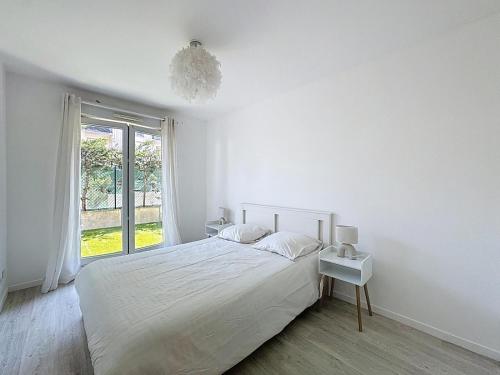 Ένα ή περισσότερα κρεβάτια σε δωμάτιο στο Apt serenity home 2 bedrooms paris cercy pontoise