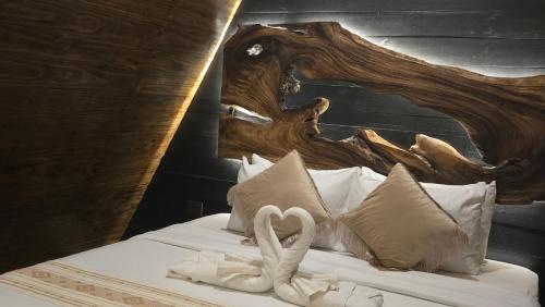 Ένα ή περισσότερα κρεβάτια σε δωμάτιο στο The Love Triangle - Glamping at Karuna El Nido