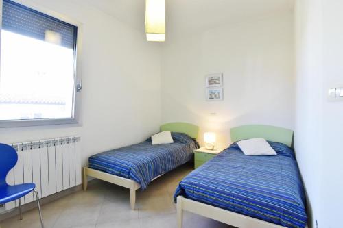 Apartments with parking space Umag - 22521
