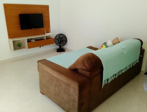 TV a/nebo společenská místnost v ubytování Casa do Pepe em Barra de Jacuípe