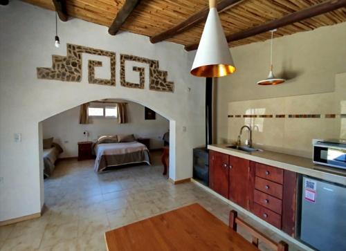 Kuchyň nebo kuchyňský kout v ubytování Pucara Taki