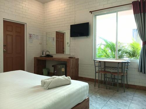 Postel nebo postele na pokoji v ubytování Three Bays Resort