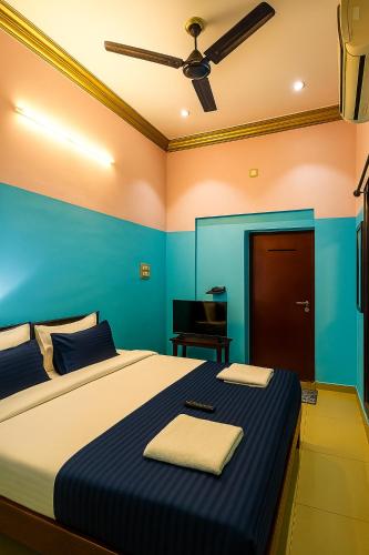 Ένα ή περισσότερα κρεβάτια σε δωμάτιο στο Le Casa Stay