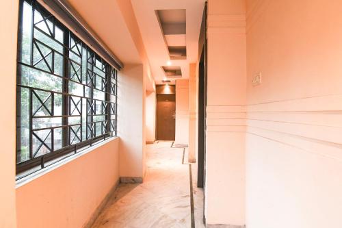 Ένα ή περισσότερα κρεβάτια σε δωμάτιο στο Hotel O The Stay