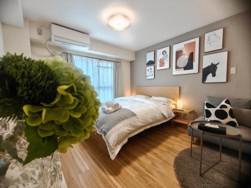 Ένα ή περισσότερα κρεβάτια σε δωμάτιο στο Sidihome 365 Apartment