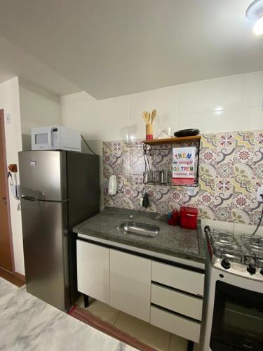 Køkken eller tekøkken på Conforto e aconchego em São João del-Rei