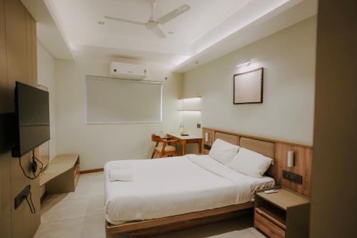 Postel nebo postele na pokoji v ubytování Alite Enclaves Fully furnished apartments