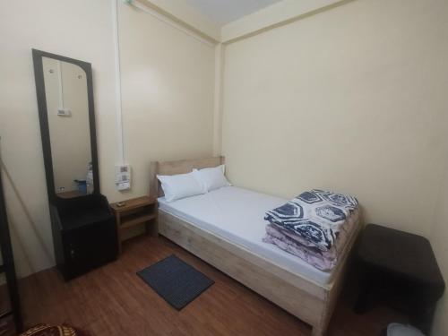 Ένα ή περισσότερα κρεβάτια σε δωμάτιο στο Hotel Unido