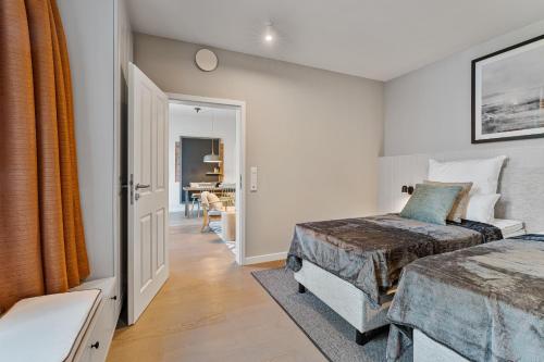 Postel nebo postele na pokoji v ubytování Alte Schule Westerhever Poppenbüll