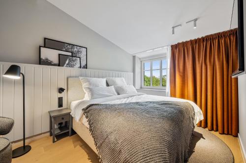 Postel nebo postele na pokoji v ubytování Alte Schule Westerhever Brösum