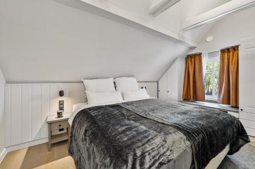 Postel nebo postele na pokoji v ubytování Alte Schule Westerhever Süderdeich