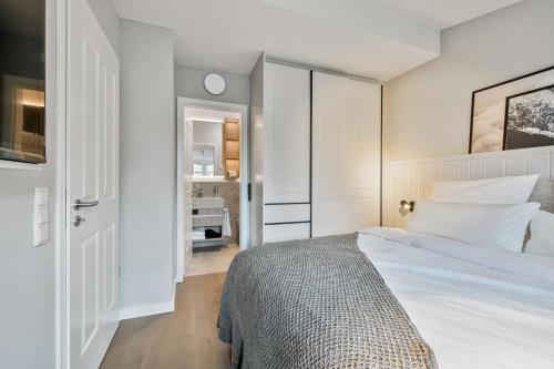 Postel nebo postele na pokoji v ubytování Alte Schule Westerhever Ehst