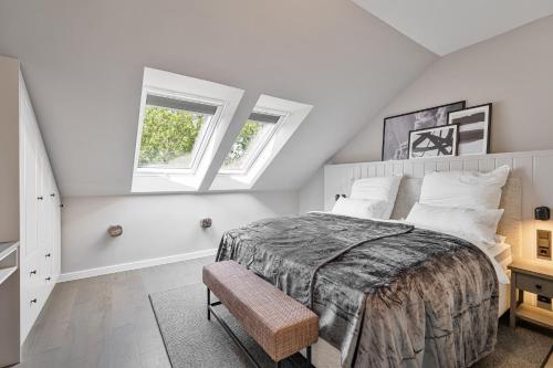 Postel nebo postele na pokoji v ubytování Alte Schule Westerhever Vollerwiek