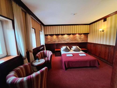 Ένα ή περισσότερα κρεβάτια σε δωμάτιο στο Hotel style apartment-studio