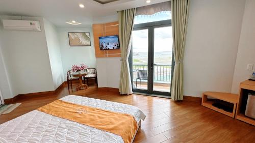 Ένα ή περισσότερα κρεβάτια σε δωμάτιο στο Thiên Trang 2 Hotel - Khách sạn gần bến tàu Rạch Giá