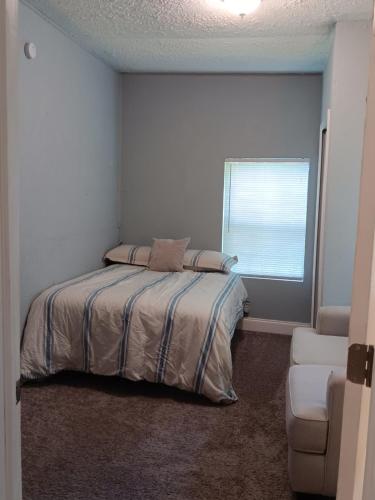 Ένα ή περισσότερα κρεβάτια σε δωμάτιο στο The Jax Hideout