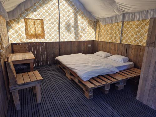 Ένα ή περισσότερα κρεβάτια σε δωμάτιο στο Arc 305 Degree Nature Camp