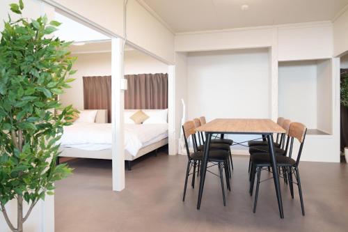 Ένα ή περισσότερα κρεβάτια σε δωμάτιο στο rice house