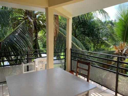 Balkón nebo terasa v ubytování L'Arbre du voyageur 17 - Grand T1 perché à Mamoudzou centre