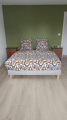 Ένα ή περισσότερα κρεβάτια σε δωμάτιο στο Le 70s 2 pièces proche Colmar