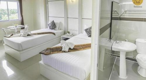 Koupelna v ubytování The Rich Residence