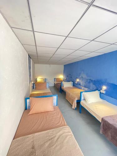 Ένα ή περισσότερα κρεβάτια σε δωμάτιο στο Ceylon Homies Ella