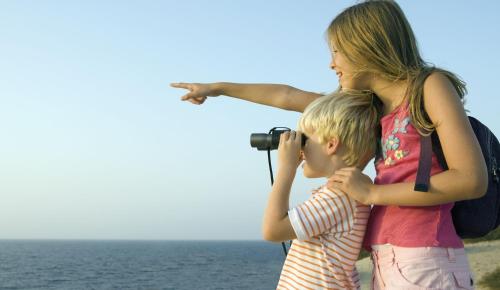 a woman and a child taking a picture with a camera at Country Inn & Suites by Radisson, Columbus, GA in Columbus
