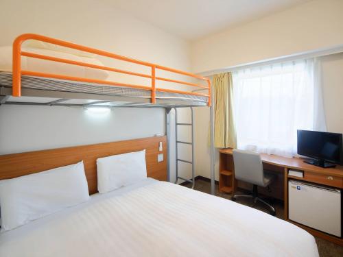 Postel nebo postele na pokoji v ubytování Comfort Inn Munakata