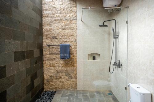 Ένα μπάνιο στο Ulu dawa Pandawa Cottage