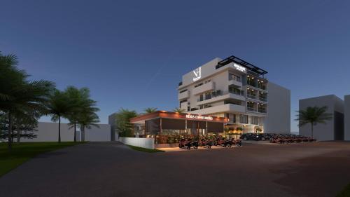 uma representação de um prédio com motocicletas estacionadas na frente em Nexus House Signature Xuân Thuỷ em Cidade de Ho Chi Minh