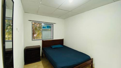 En eller flere senge i et værelse på Casa de Edi Santa Marta