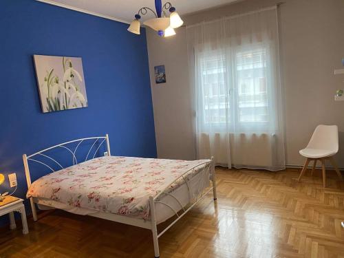 Ένα ή περισσότερα κρεβάτια σε δωμάτιο στο MARIAS APARTMENT TRIKALa