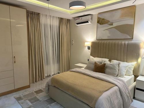 Postel nebo postele na pokoji v ubytování Aha 3G