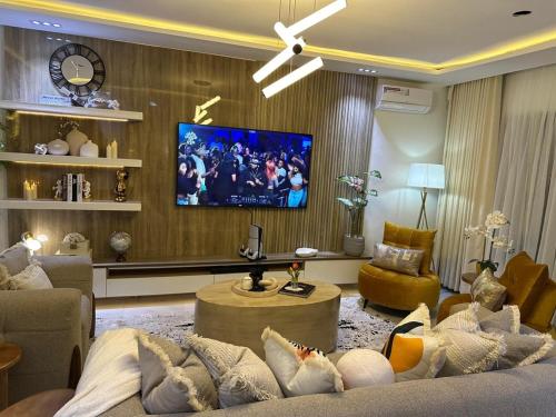 TV a/nebo společenská místnost v ubytování Aha 3G