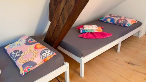 Postel nebo postele na pokoji v ubytování Grandhouse Olten City Apartments