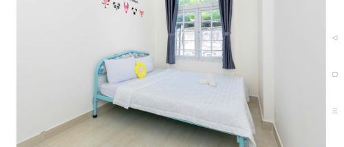 Postel nebo postele na pokoji v ubytování Nhà Nguyên Căn VÕ THỊ SÁU homestay