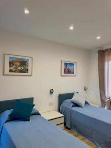 Postel nebo postele na pokoji v ubytování Olmata B&b