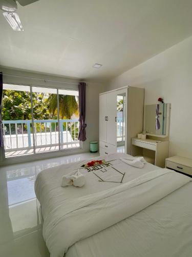 Ένα ή περισσότερα κρεβάτια σε δωμάτιο στο Jazeeraa beach stay