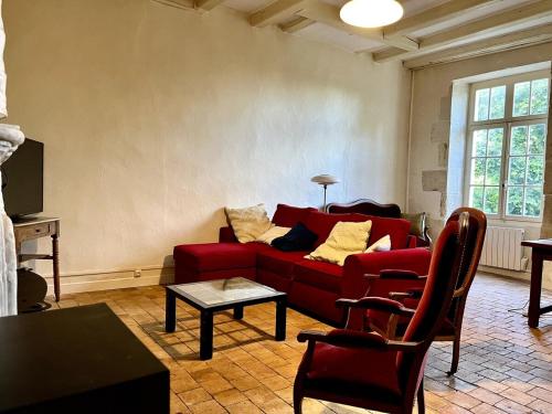 Χώρος καθιστικού στο Le Presbytère de la Couture