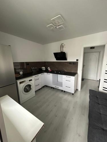 Η κουζίνα ή μικρή κουζίνα στο Апартаменти