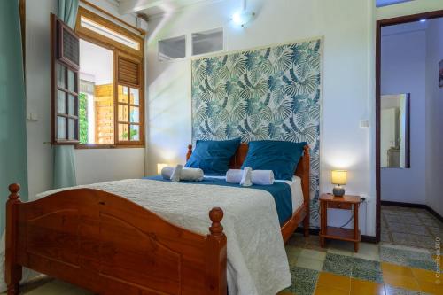 Postel nebo postele na pokoji v ubytování Le tableau vivant