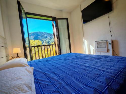 Postel nebo postele na pokoji v ubytování Con espacio y tranquilo, comodidad máxima para la família - Besiberri 6